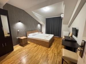 Voodi või voodid majutusasutuse Apartments Philip II toas