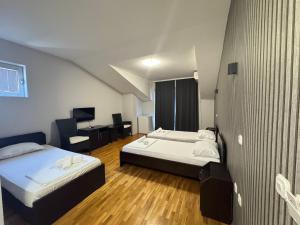 Voodi või voodid majutusasutuse Apartments Philip II toas