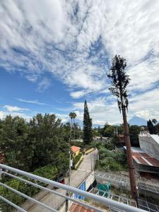 a view of a city from a balcony at Hostal Ramé in Panajachel