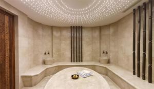 a bathroom with two sinks and a bath tub at Hyatt Regency Istanbul Atakoy in Istanbul