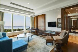 a living room with a view of the ocean at Hyatt Regency Istanbul Atakoy in Istanbul