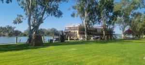 a large building with a gazebo in a park at River Cottage at Mannum in Mannum