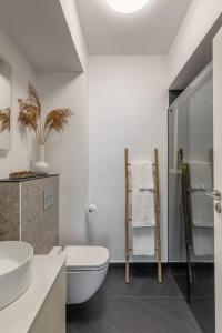 Et badeværelse på Lake Sunsets at Verona Residence Mamaia