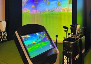 a video game on a nintendo wii in a room at Oasis апартаменты на левом берегу, новый ремонт in Astana