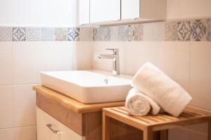 Koupelna v ubytování Gästehaus Erika - by myNests + 37 fotografií