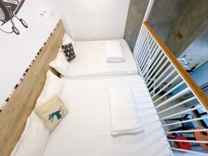 Postel nebo postele na pokoji v ubytování Haian Corner Homestay