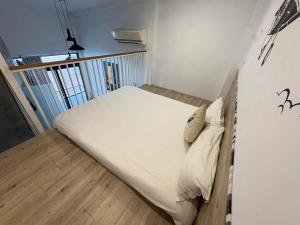 Postel nebo postele na pokoji v ubytování Haian Corner Homestay
