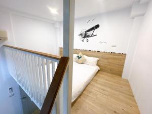 Postel nebo postele na pokoji v ubytování Haian Corner Homestay
