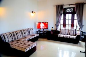 Khu vực ghế ngồi tại Villana Villa Bentota