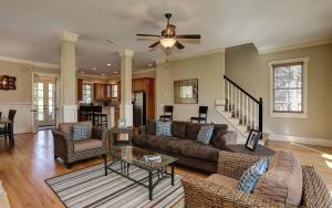 a living room with a couch and a table at Choctaw Lodge -Play ping pong Relax by the wood fireplace Grill in Jasper
