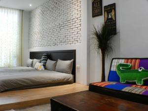Ένα ή περισσότερα κρεβάτια σε δωμάτιο στο Anping House