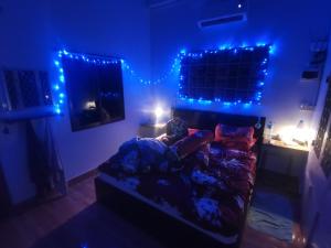 Letto o letti in una camera di Bar Ang Guesthouse
