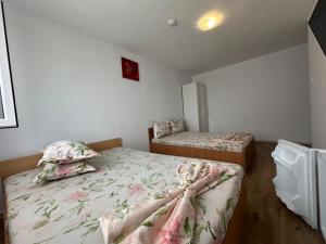 Postel nebo postele na pokoji v ubytování Vila 5