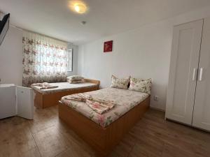 Postel nebo postele na pokoji v ubytování Vila 5
