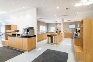 Kuchyňa alebo kuchynka v ubytovaní Eco Suite Hotel