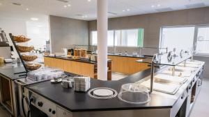 Kuchyňa alebo kuchynka v ubytovaní Eco Suite Hotel