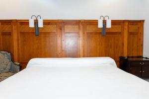 Ein Bett oder Betten in einem Zimmer der Unterkunft Hotel Restaurante Setos