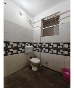 Ένα μπάνιο στο Gauri Shankar P Guest house