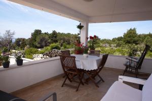 En terrasse eller udendørsområde på Apartment Dita