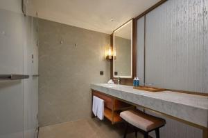 Bilik mandi di Maison New Century Tongxiang