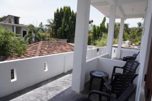 En balkon eller terrasse på Bay Hut + 30 billeder