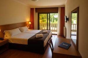 Кровать или кровати в номере Hotel Avión by Bossh! Hotels