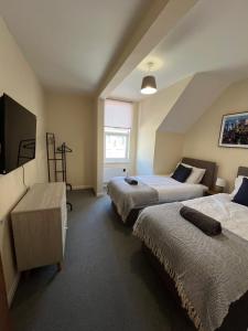 Postel nebo postele na pokoji v ubytování 2 Bedroom Apartment in Swindon Town Centre