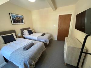 Postel nebo postele na pokoji v ubytování 2 Bedroom Apartment in Swindon Town Centre