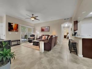 a living room with a couch and a table at Southern #1114 Mesa in Mesa