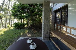 Ein Balkon oder eine Terrasse in der Unterkunft Avadale Munnar (Stag Groups Not Allowed)