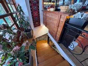an overhead view of a kitchen with a stove at Submarine 105 Rooms in Gjirokastër +20 photos