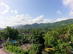 a view of a mountain range with a road at Royal Lion Hotel - Kandy Road, Galagadara in Galagedara +127 photos
