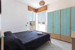 Postel nebo postele na pokoji v ubytování Villetta Mina - Salento Reservation