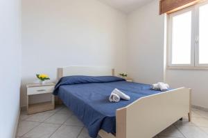 Postel nebo postele na pokoji v ubytování Villetta Mina - Salento Reservation