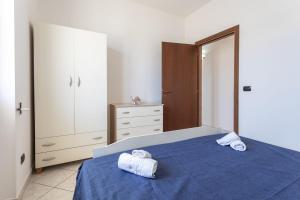 Postel nebo postele na pokoji v ubytování Villetta Mina - Salento Reservation