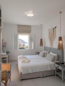 Кровать или кровати в номере Hotel Benois
