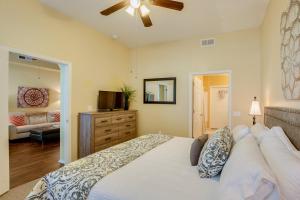 a bedroom with a large bed with a ceiling fan at Mountain View #11107 Surprise in Surprise +14 photos
