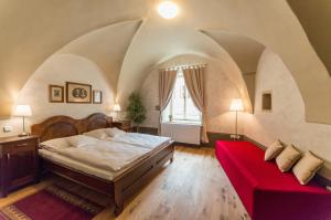 Postel nebo postele na pokoji v ubytování Latrán 43 apartments