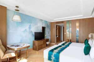 Postel nebo postele na pokoji v ubytování hotel julee