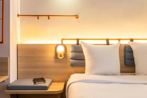 Postel nebo postele na pokoji v ubytování Hotel Siru Brussels