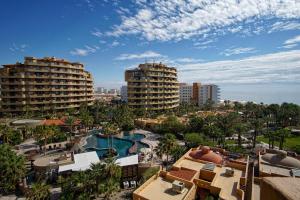 a view of a resort with a pool and buildings at Bella Sirena in La Choya