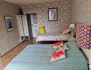 ギデルにあるTy Capitaine Chambres d'hôtes Guidelのベッドルーム(ベッド2台付) +17枚の写真
