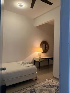 Postel nebo postele na pokoji v ubytování Sampoisgt Villa Homestay - Near Bangi Avenue, BACC, UKM, GMI, EVO, Bangi Gateway, KIPMall