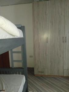 Postel nebo postele na pokoji v ubytování Kikao Fiti