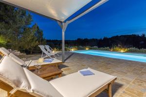 Swimmingpoolen hos eller tæt på Trulli Oasis + 26 billeder