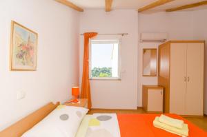 Posteľ alebo postele v izbe v ubytovaní Apartments Pavle
