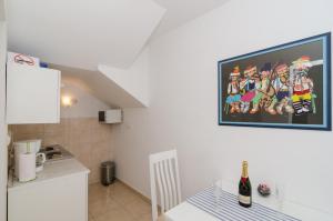 Kuchyňa alebo kuchynka v ubytovaní Apartments Pavle