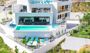 an aerial view of a villa with a swimming pool at Villa Charlotte by Algarve Vacation in Armação de Pêra