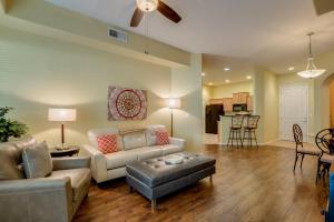 a living room with a couch and a table at Mountain View #11107 Surprise in Surprise