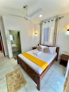 Ένα ή περισσότερα κρεβάτια σε δωμάτιο στο 1 bedroom blessed apartments